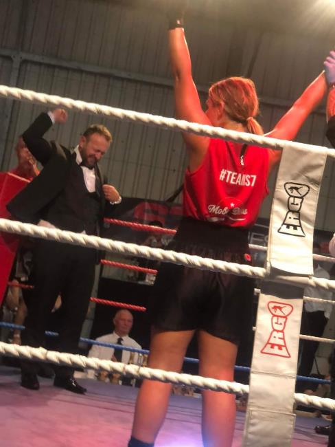 Wife Emily wins her boxing bout